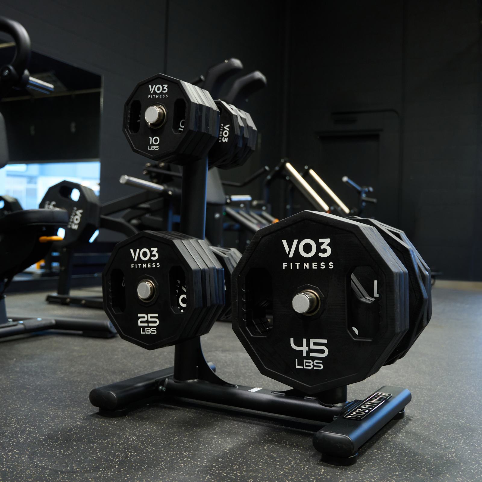 VO3 bumper plates on a plate tree
